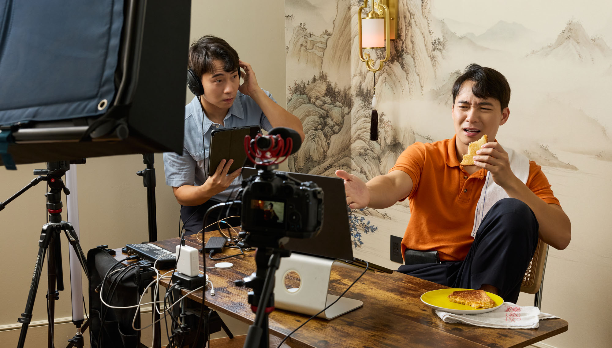 Nigel Ng filming an Uncle Roger video